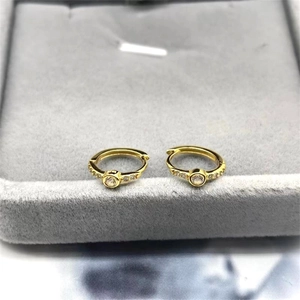 Boucles d'oreilles huggie en argent S925 doré avec pierres de zircone cubiques