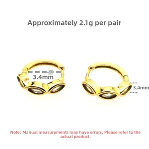 Détails de boucles d'oreilles créoles dorées avec zircons taille marquise en argent 925