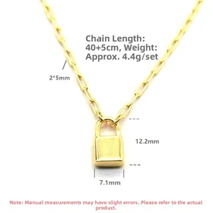 Detailed view of polished gold lock pendant and rectangular link chain with measurements