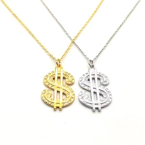 Détail de pendentifs dollar hip hop argent et or avec des zircons cubiques scintillants