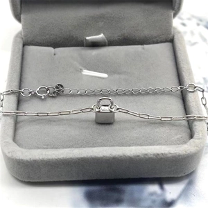 Macro view of S925 sterling silver lock pendant with adjustable chain and spring clasp
