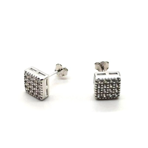 Macro detail of S925 sterling silver square stud earrings with pave-set cubic zirconia