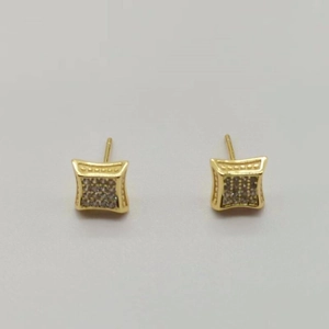 Close-up of gold square stud earrings with pave-set cubic zirconia and beaded edges