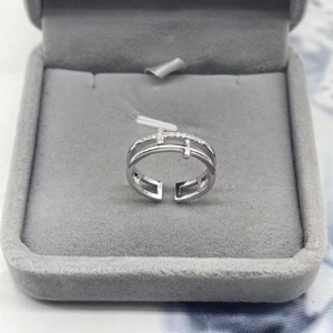 Double-layered S925 sterling silver cross ring with sparkling cubic zirconia in a jewelry box