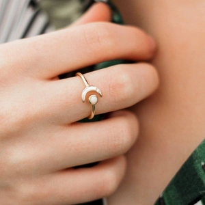 Elegant gold S925 sterling silver moon and opal open ring worn on female hand