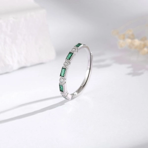 Elegant S925 silver ring featuring rectangular green emeralds and adjustable open design
