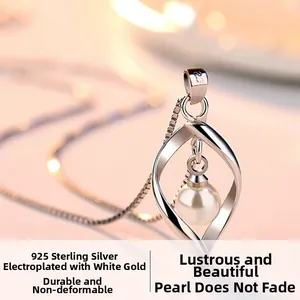 Macro shot of 925 sterling silver shell pearl pendant with exquisite flame-shaped frame