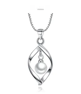 Macro view of S925 sterling silver twisted pendant with a white pearl on a silver box chain