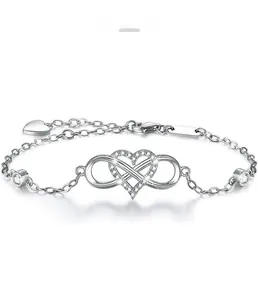 Macro shot of 925 sterling silver infinity heart bracelet with cubic zirconia detailing