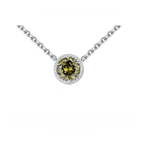 Macro shot of 925 sterling silver necklace with olive green zircon in twisted frame