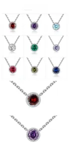 Detail view of 925 sterling silver necklaces featuring nine different round birthstones