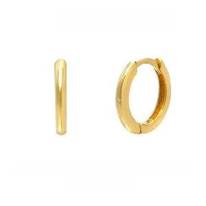 Detail view of gold geometric hoop earrings showing the secure clasp and polished finish