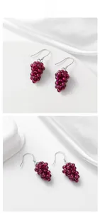 Detail view of handcrafted 925 silver drop earrings with garnet red grape cluster beads