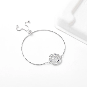 Detail of 925 silver tree of life bracelet with blue stones and adjustable sliding box chain