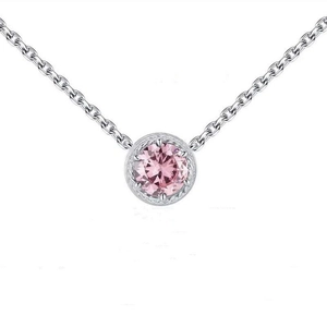 Detail of 925 sterling silver necklace featuring a round pink birthstone in a retro setting
