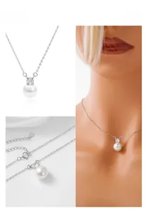 Dettaglio collana in argento S925 con perla bianca e ciondolo in zircone