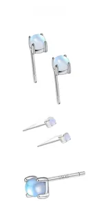 Detailed view of S925 sterling silver four-claw setting with round blue moonstone stud earring
