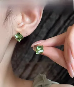 Macro view of green cube crystal earrings showing sparkling facets and S925 silver studs