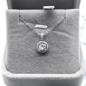 Classic S925 sterling silver necklace featuring a sparkling round halo pavé diamond pendant