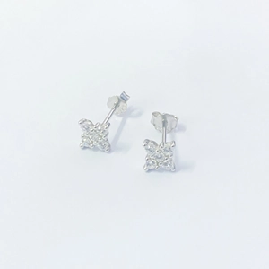 Sparkling S925 sterling silver four-petal flower stud earrings with clear crystals