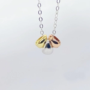 Three-tone teardrop pendant necklace in gold, silver and rose gold for women