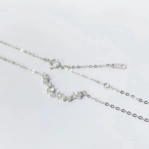 S925 sterling silver smile necklace featuring a curved row of white zircon crystals