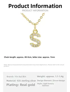Detail showing letter S zircon pendant with size specs and 925 silver gold plating info