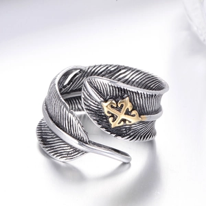 Retro gothic feather open ring in vintage silver with gold star totem detail