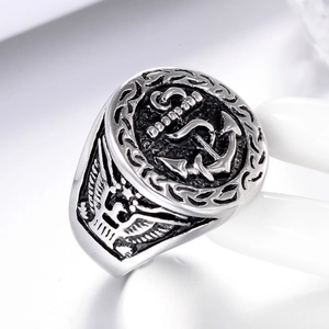 Detail of vintage anchor ring with eagle wings and polished stainless steel finish
