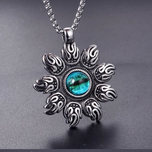 Vintage stainless steel sun pendant with a blue-green eye gem on a box chain necklace
