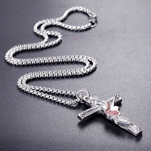 Polished stainless steel crucifix necklace with red heart stone on venetian chain