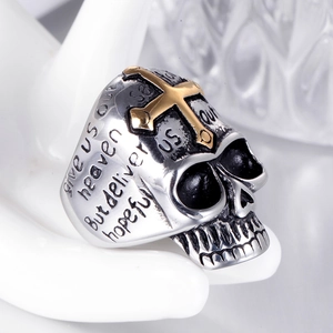 Vintage punk skull ring with golden cross and inspirational engraving in stainless steel