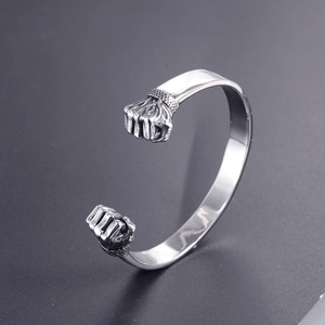 Bracelet jonc vintage en acier inoxydable avec motif double poing de boxe en argent