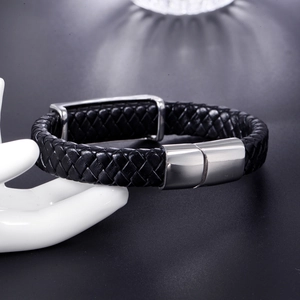 Braided black leather bracelet with silver magnetic steel clasp on white hand model