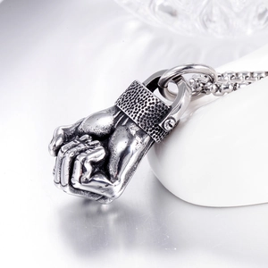 Creative fist-shaped stainless steel pendant necklace with vintage silver finish on chain