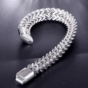 Men's double-row stainless steel wheat chain bracelet with a polished magnetic clasp
