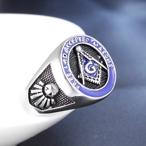 Vintage stainless steel Freemason ring with blue enamel and skull relief detail