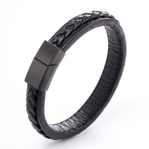 Detailed view of black braided leather bracelet featuring a matte magnetic metal clasp