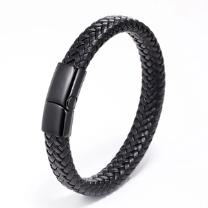 Detail of multi-strand black braided leather bracelet with matte magnetic clasp