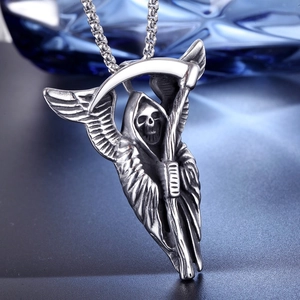 Detailed close-up of gothic grim reaper pendant in antique finish with scythe and wings