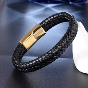 Handcrafted men's braided black leather bracelet with a polished gold magnetic clasp