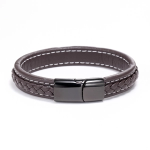 Close-up of brown leather braided bracelet with magnetic black stainless steel clasp
