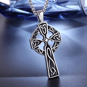 Vintage silver Celtic knot cross pendant in stainless steel with textured oxidization finish