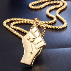 Gold stainless steel necklace with a powerful fist pendant on a round box chain
