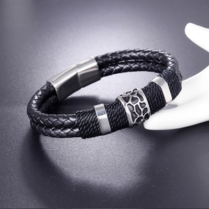 Men's double-layered black woven leather bracelet with magnetic steel clasp on hand mold