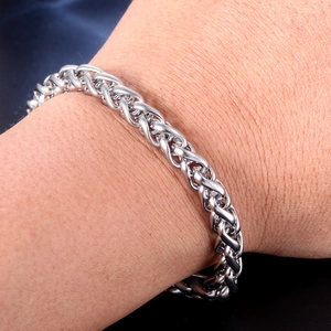 Polished silver wheat chain bracelet for men in durable stainless steel on wrist