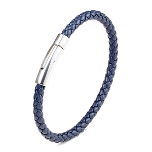 Deep blue braided leather bracelet with polished silver stainless steel buckle on white back