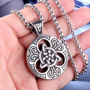 Detail shot of Celtic Knot pendant in vintage silver finish with stainless steel box chain