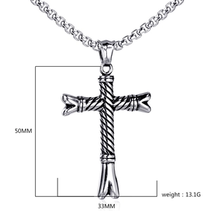 Detailed view of vintage silver cross pendant with size measurements and box chain