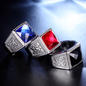 Vintage men's square gemstone rings set in blue, red, and black with embossed band detail